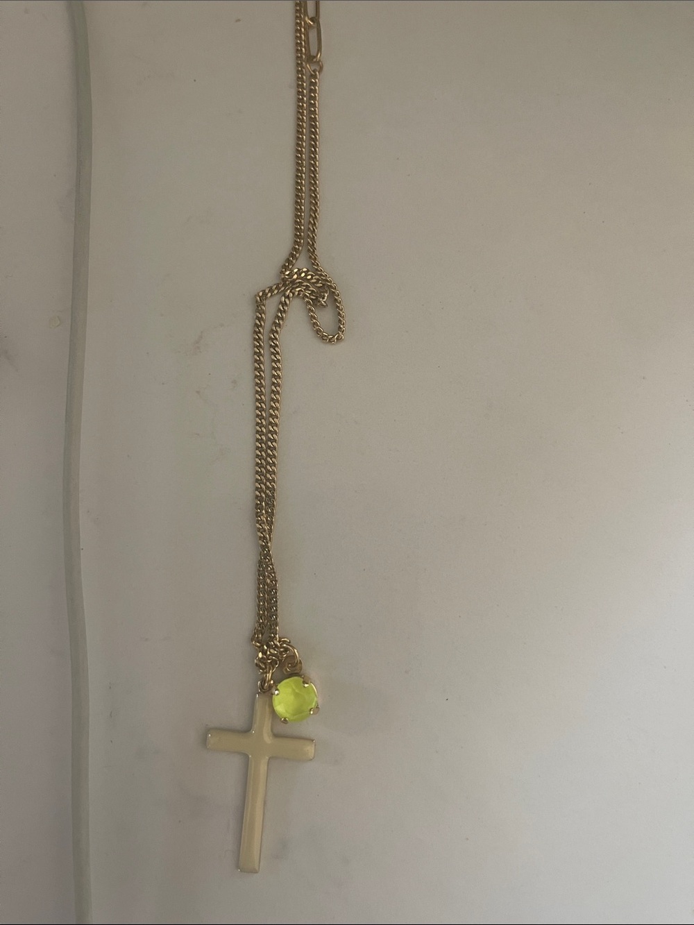 Tova Gold Chain Necklace with bright yellow green crystal with yellow cross
